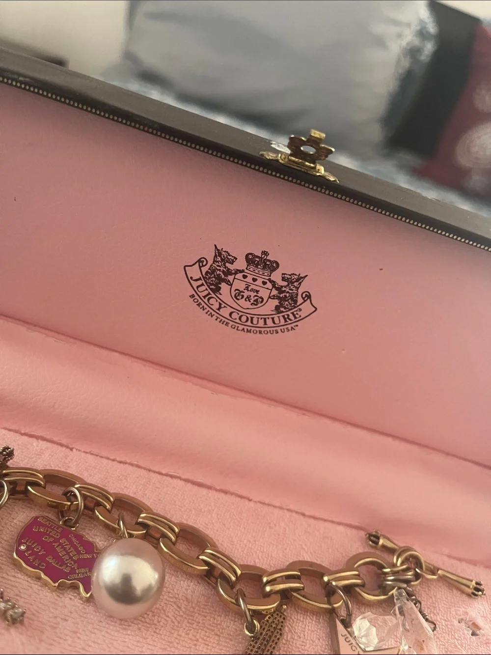 Juicy Couture Gold Tone Charm Bracelet with Pink and Pearl Accents